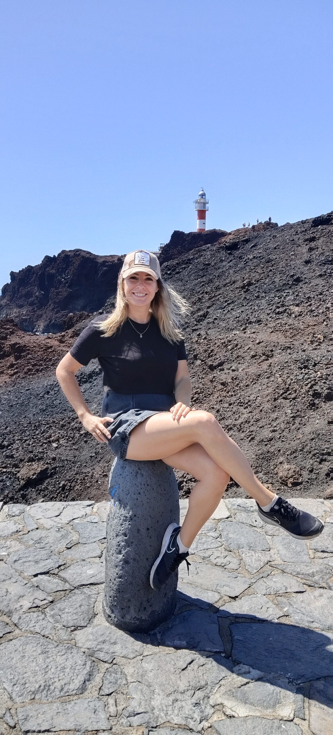 Ewa sitting on rocks